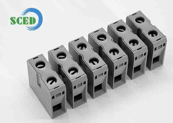 Tensioni di sovratensione nominali Nessuna anomalia entro 1 minuto Blocchi terminali passanti grigi per pannello che forniscono connessioni elettriche per uso industriale